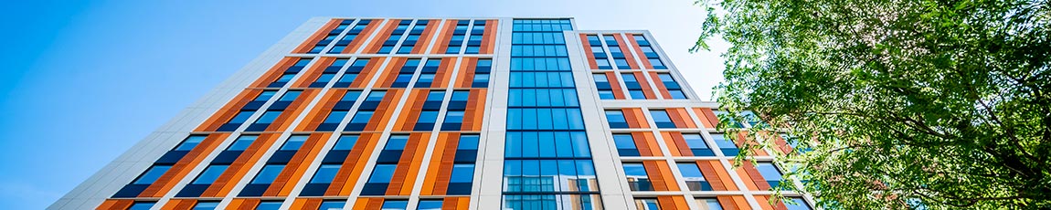 View looking up at a Coventry University accommodation building.