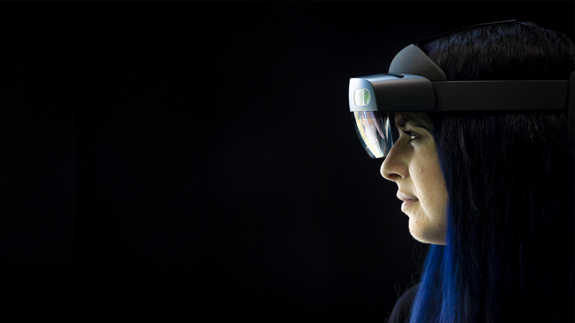 Female student wearing a virtual reality headset