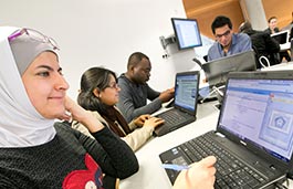 Students working on laptops