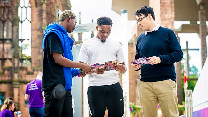 Group of students in university square talking