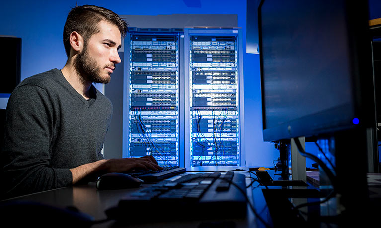 Student sat in computer lab