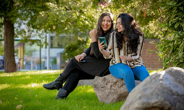 Students sitting talking together 