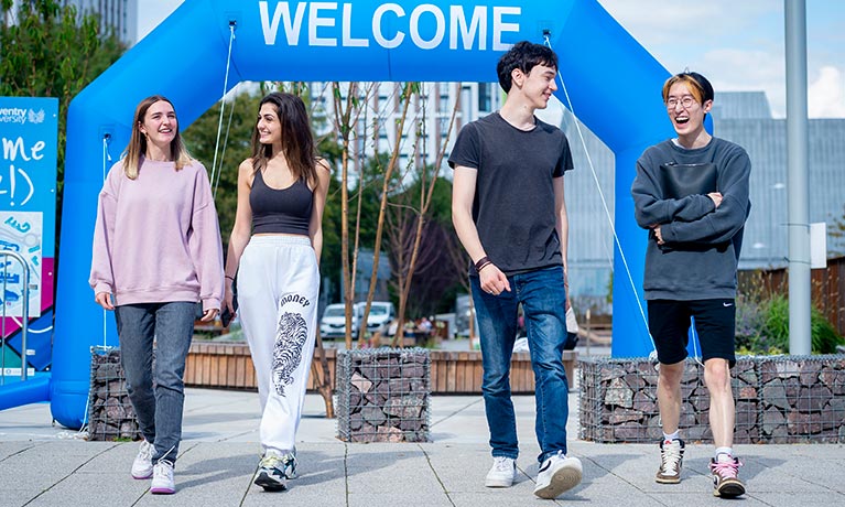 Students walking together at an event