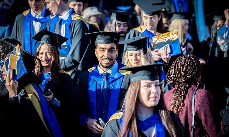 group of graduates on graduation day 