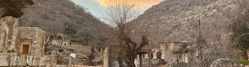 Stone buildings in a valley at Lalish, the holy place of the Yazidis