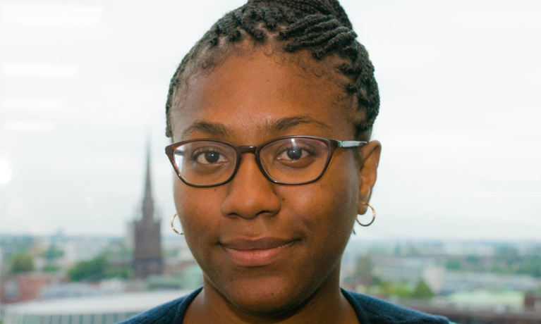 A close up portrait of cherisse with coventry in the background