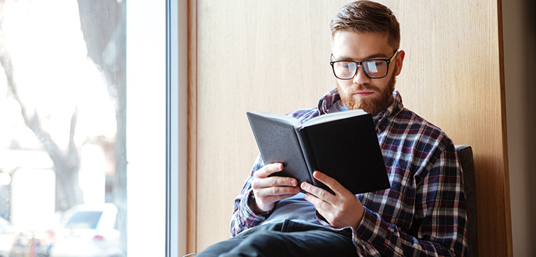 Student reading a book