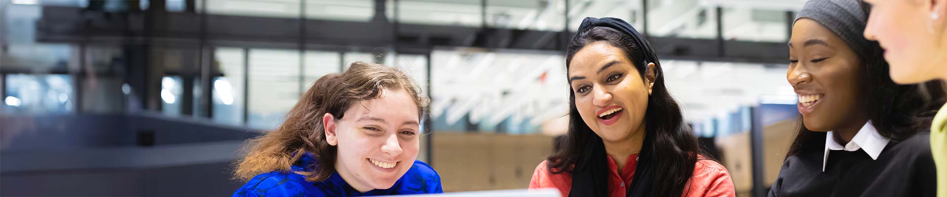 Female students in discussion in the Delia Derbyshire building