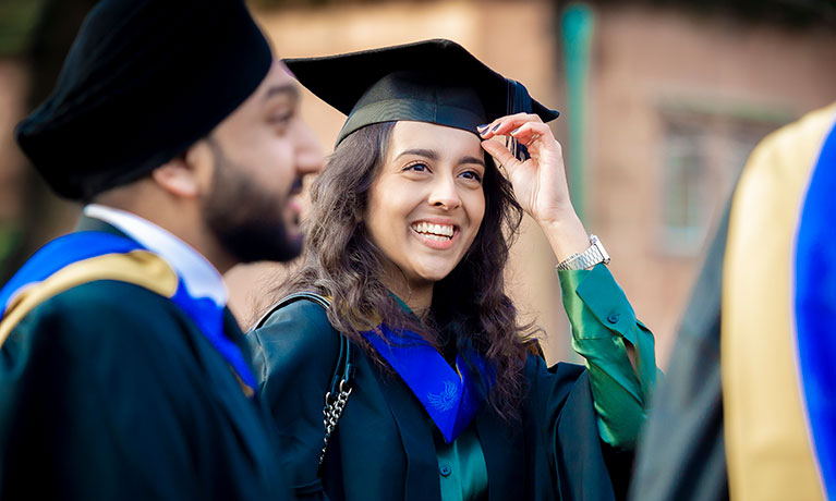 Students wearing graduation gowns