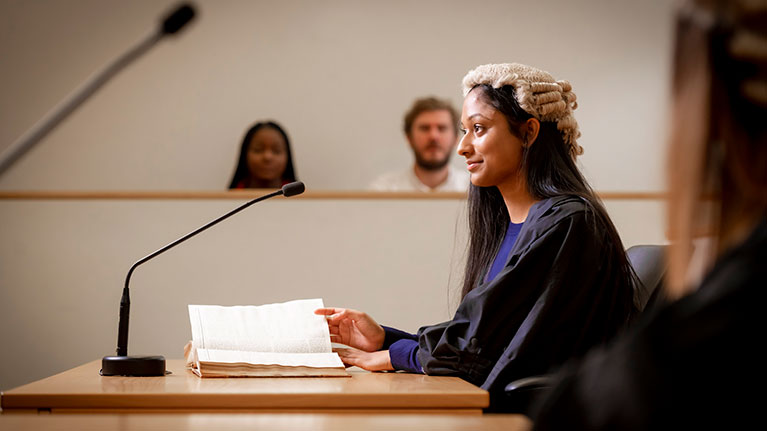 A barrister in-training at Coventry University moot room at George Eliot building