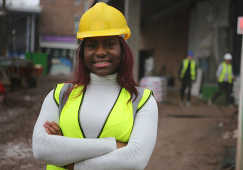 Damilola Ola wearing a hardhat 