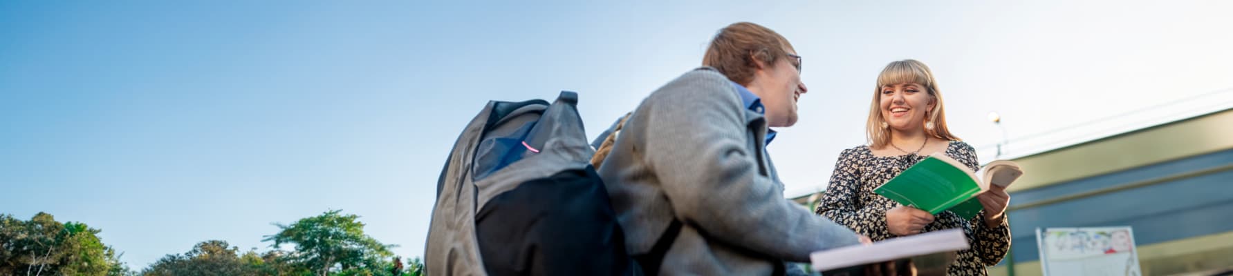 Two students reading books