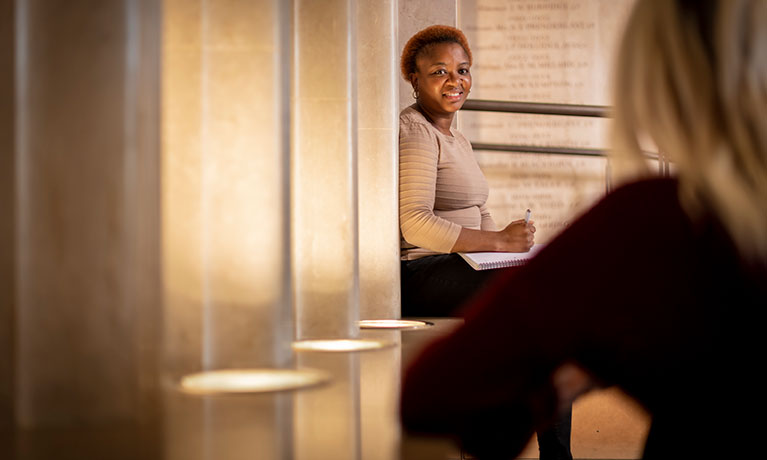 Students sitting outside CU London