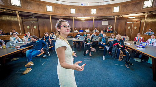 Lecturer teaching in front of a class