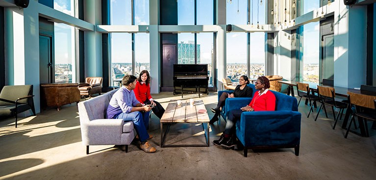 Students sitting together in a common room