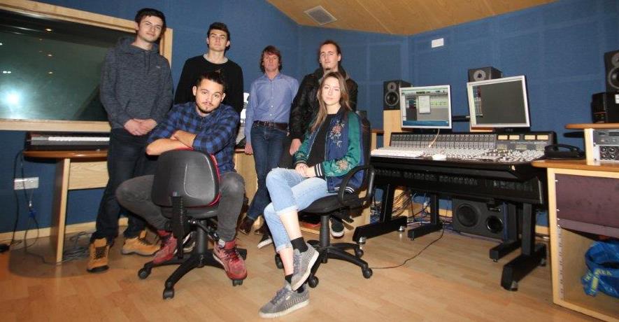 A group of students in a music studio