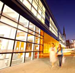 Outside The Hub building showing people walking past